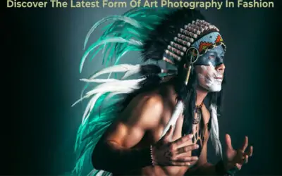 A male model wearing a feathered headdress and face paint, striking a dynamic pose.