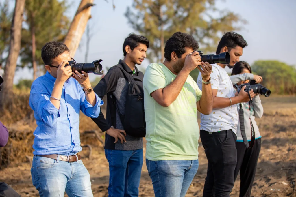 Hands-on learning: Students practicing camera mechanics and framing during an outdoor practical session at MDPS.